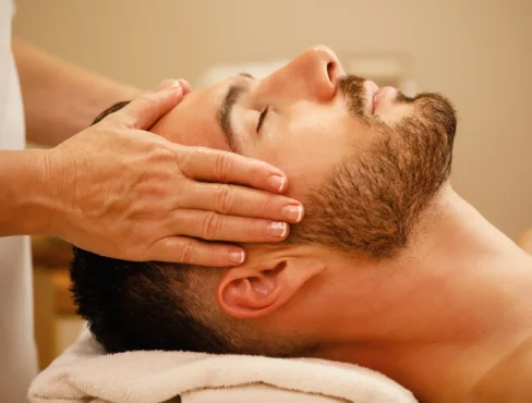 closeup-man-getting-head-massage-relaxing-with-eyes-closed-spa